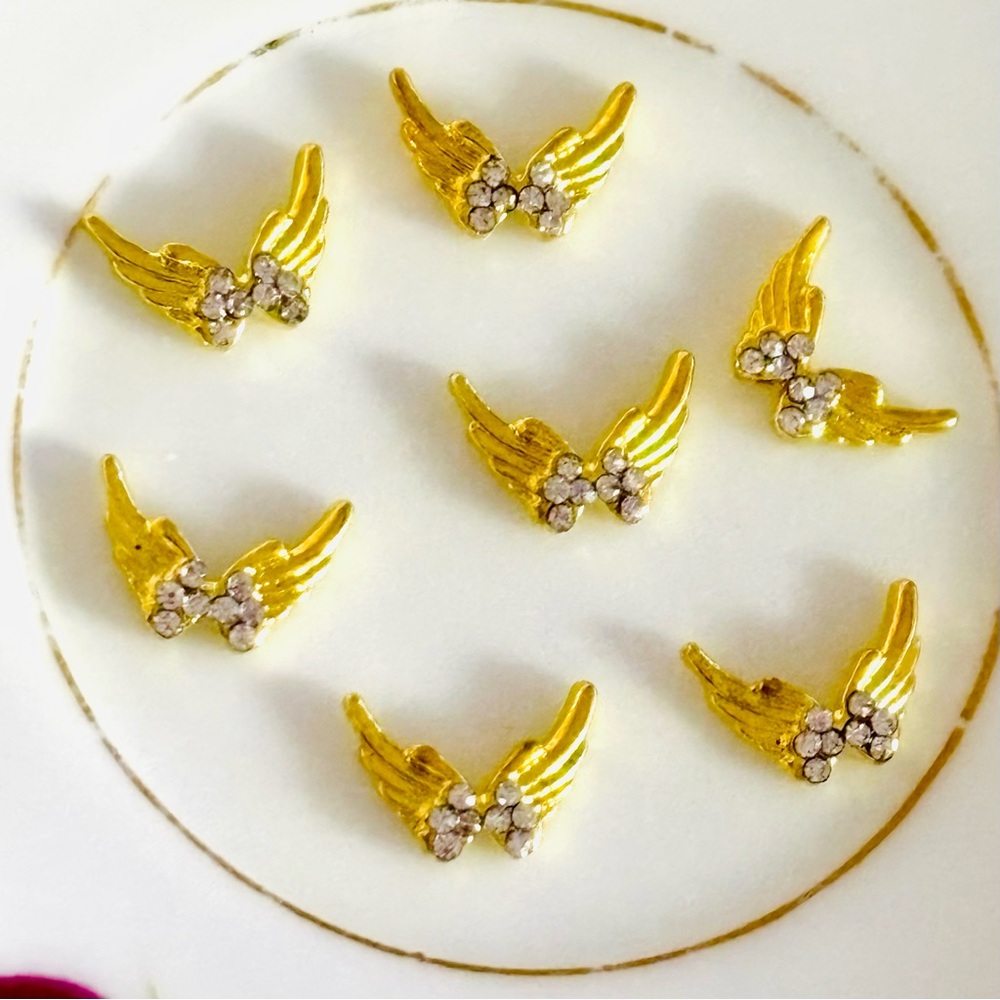 Wing Rare Gold Tone Winged nail charms 7 pieces with Crystals accent.